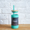 glass water bottle with straw